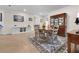 Inviting dining area with a round table, china cabinet, and neutral decor at 2137 Raglan Cir, Ormond Beach, FL 32174