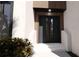 Stylish front door with modern design, accentuating the home's contemporary aesthetic and curb appeal at 2360 Ocean Shore Blvd # 1, Ormond Beach, FL 32176