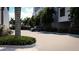 Well-maintained parking area with landscaping and a sleek SUV parked nearby at 2360 Ocean Shore Blvd # 1, Ormond Beach, FL 32176