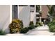 Exterior view of tropical landscaping surrounding building at 2360 Ocean Shore Blvd # 2, Ormond Beach, FL 32176