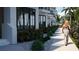 Exterior view of tropical landscaping surrounding building at 2360 Ocean Shore Blvd # 2, Ormond Beach, FL 32176