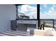 Outdoor kitchen with modern appliances and ocean views, perfect for grilling and entertaining guests at 2360 Ocean Shore Blvd # 2, Ormond Beach, FL 32176