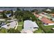 Desirable residential area with manicured lawns, beautiful landscaping, and a serene waterfront in the distance at 39 Benjamin Dr, Ormond Beach, FL 32176