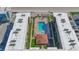 Aerial view of the building showcasing the large rectangular community pool and surrounding deck area at 4155 S Atlantic Ave # 204, New Smyrna Beach, FL 32169
