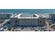 Stunning aerial shot of a condo complex on the beachfront with a parking lot at 4155 S Atlantic Ave # 204, New Smyrna Beach, FL 32169