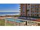 Enjoy the ocean view from the pool, a perfect relaxation spot at 4155 S Atlantic Ave # 204, New Smyrna Beach, FL 32169