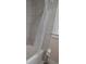 Clean bathroom featuring bathtub, shower and toilet at 441 N Kentucky Ave, Deland, FL 32724