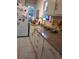 Bright kitchen featuring a sink, modern appliances, ample counter space, and cabinet storage at 441 N Kentucky Ave, Deland, FL 32724