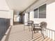 A shared balcony sitting area with furniture overlooks the side of the building at 89 S Atlantic Ave # 1004, Ormond Beach, FL 32176