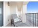 Balcony featuring lounge chair, ocean view, and tiled floor at 89 S Atlantic Ave # 1004, Ormond Beach, FL 32176