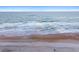 Beach view with sand and ocean at 89 S Atlantic Ave # 1004, Ormond Beach, FL 32176