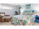 This cozy bedroom offers a place to exercise, relax, and sleep at 89 S Atlantic Ave # 1004, Ormond Beach, FL 32176