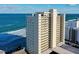 Beautiful high rise condo exterior showcasing multiple floors with expansive ocean views at 89 S Atlantic Ave # 1004, Ormond Beach, FL 32176