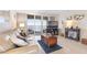 Bright living room featuring ocean views, comfortable seating, and coastal-inspired decor at 89 S Atlantic Ave # 1004, Ormond Beach, FL 32176