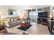 Inviting living room with cozy furniture, ocean views, and tile flooring at 89 S Atlantic Ave # 1004, Ormond Beach, FL 32176