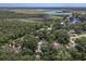 Scenic aerial view of a waterfront home near a beautiful marsh and Intracoastal waterway at 1108 Shockney Dr, Ormond Beach, FL 32174