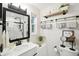 Charming full bathroom with updated fixtures, granite countertops, and decorative shelving at 1108 Shockney Dr, Ormond Beach, FL 32174