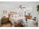 Bright bedroom offering matching dressers, a ceiling fan, and warm, inviting lighting at 1108 Shockney Dr, Ormond Beach, FL 32174
