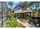 Charming dock and waterside area featuring boat access, a lift, and serene natural surroundings at 1108 Shockney Dr, Ormond Beach, FL 32174