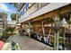 Spacious dock with canopy swing, wooden supports, and waterway access creating a relaxing waterfront retreat at 1108 Shockney Dr, Ormond Beach, FL 32174