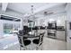Modern kitchen with granite countertops, stainless appliances, bar seating and bright, natural light at 1108 Shockney Dr, Ormond Beach, FL 32174