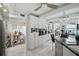 Spacious kitchen featuring white cabinets, granite countertops, and stainless steel appliances at 1108 Shockney Dr, Ormond Beach, FL 32174