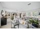 Open-concept living area connecting to the kitchen and dining spaces with plenty of natural light at 1108 Shockney Dr, Ormond Beach, FL 32174