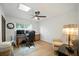 Comfortable office space featuring hardwood floors and a ceiling fan at 1108 Shockney Dr, Ormond Beach, FL 32174