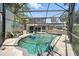 Private screened pool with brick patio, perfect for relaxation at 1108 Shockney Dr, Ormond Beach, FL 32174
