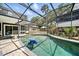 Private screened pool with brick patio, perfect for relaxation at 1108 Shockney Dr, Ormond Beach, FL 32174