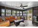Inviting sun room featuring a comfortable seating area and windows at 1108 Shockney Dr, Ormond Beach, FL 32174
