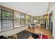 Sun room with exercise area and lots of windows at 1108 Shockney Dr, Ormond Beach, FL 32174