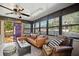 Inviting sun room featuring a comfortable seating area and windows at 1108 Shockney Dr, Ormond Beach, FL 32174