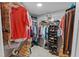 Well-organized walk-in closet with multiple racks, shelves, and shoe storage at 1254 Royal Pointe Ln, Ormond Beach, FL 32174