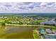 Panoramic aerial shot of the Plantation Bay community, highlighting the golf course, lakes, and homes at 1254 Royal Pointe Ln, Ormond Beach, FL 32174