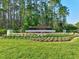 Well-manicured entrance to Plantation Bay Golf & Country Club at 1254 Royal Pointe Ln, Ormond Beach, FL 32174