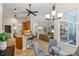 Open-concept living area showcasing the kitchen, dining area, and living room at 1254 Royal Pointe Ln, Ormond Beach, FL 32174