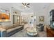 Spacious living room showcases the open layout to the dining area and kitchen at 1254 Royal Pointe Ln, Ormond Beach, FL 32174