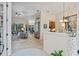 Open-concept living space showcasing elegant flooring, a stylish dining area, and abundant natural light at 1254 Royal Pointe Ln, Ormond Beach, FL 32174