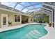 Screened-in pool area with an outdoor lounge, and a covered patio perfect for entertaining at 1254 Royal Pointe Ln, Ormond Beach, FL 32174