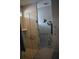 Modern bathroom with a glass-enclosed shower and accessibility grab bars at 146 Via Madrid Dr, Ormond Beach, FL 32176