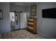 Cozy bedroom with a view to an ensuite bathroom at 146 Via Madrid Dr, Ormond Beach, FL 32176