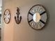 Nautical themed decorative art on a wall featuring decorative wooden rings and anchor at 146 Via Madrid Dr, Ormond Beach, FL 32176