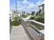 A scenic view from the beach access, showing the neighborhood street and homes at 146 Via Madrid Dr, Ormond Beach, FL 32176
