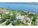 Aerial view showcasing the gray roof of the single-story home near the water at 1650 Riverside Dr, Daytona Beach, FL 32117