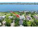Aerial view showcasing the gray roof of the single-story home near the water at 1650 Riverside Dr, Daytona Beach, FL 32117