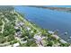 A stunning aerial shot showcasing waterfront homes along a picturesque river, ideal for boating at 1650 Riverside Dr, Daytona Beach, FL 32117