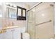 Full bathroom with shower, vanity, lighting and storage at 1650 Riverside Dr, Daytona Beach, FL 32117
