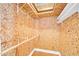 Walk-in closet with shelving, hanging rods, and an access door at 1650 Riverside Dr, Daytona Beach, FL 32117