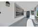 A cozy, covered front porch, perfect for relaxing and enjoying the neighborhood view at 1650 Riverside Dr, Daytona Beach, FL 32117